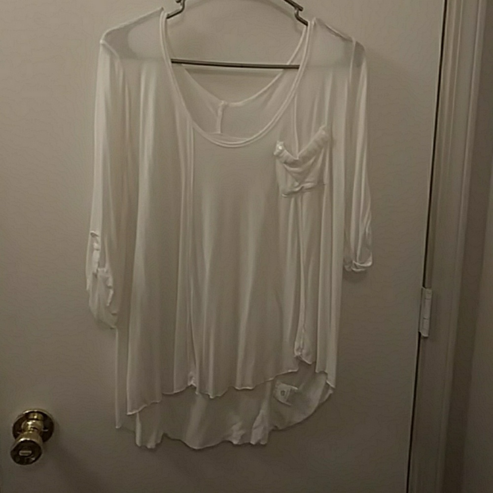 White rayon pullover top.